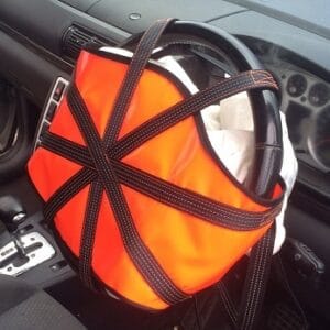 Air bag restrainers Successfully tested by several UK FRS the air bag restrainers are made from tough, flag stitched webbing and PVC tarpaulin. Easy to fit, they remove the threat of injury from driver air bag deployment at the RTC. The product comes with an Equipment Qualification report and test certificate, copies available on request. The unit price is some 30% less expensive than other examples on the market.